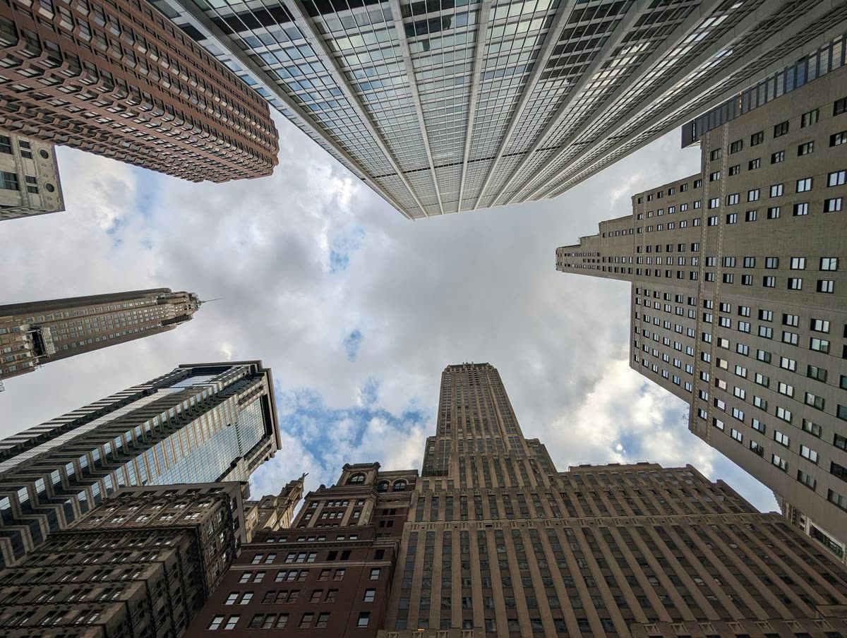 Looking up at Manhattan skyscrapers in New York City's financial district